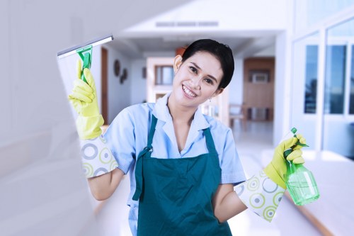 Deep cleaning of kitchen and bathroom areas in an E14 property