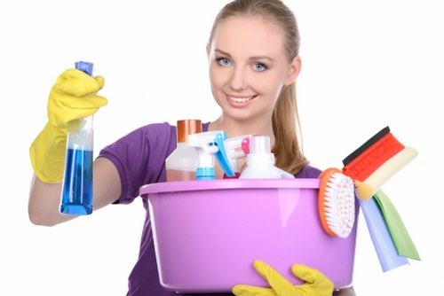Safety-focused carpet cleaning operator using protective equipment