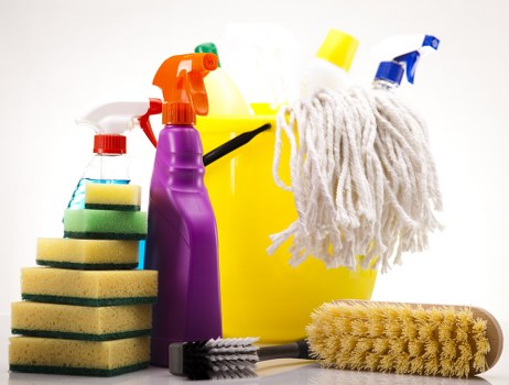 Worker following safety procedures during carpet cleaning